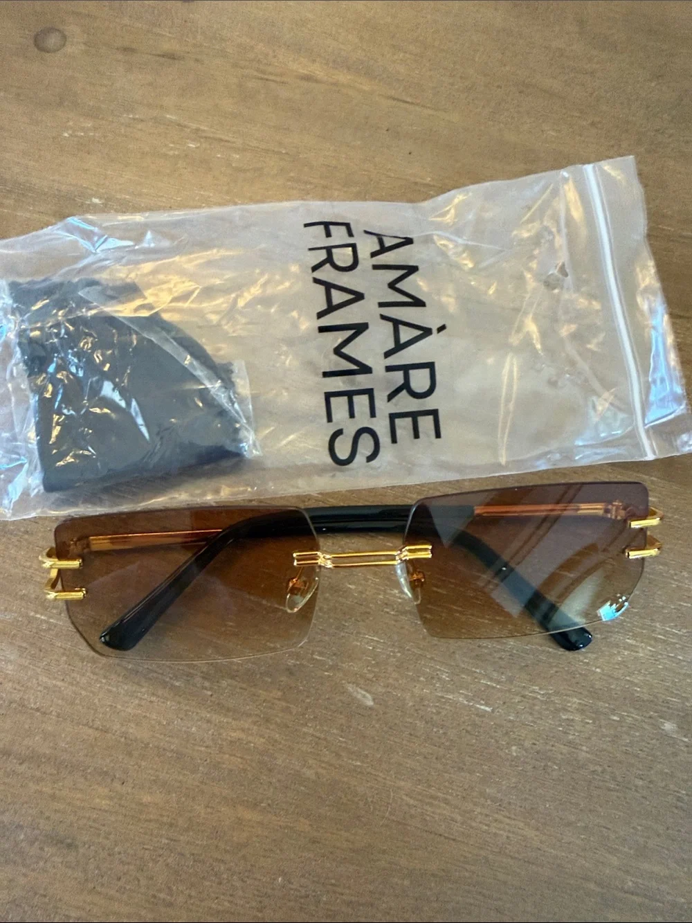 AMARE FRAMES Rimless Brown Gradient Sunglasses with Gold Accents